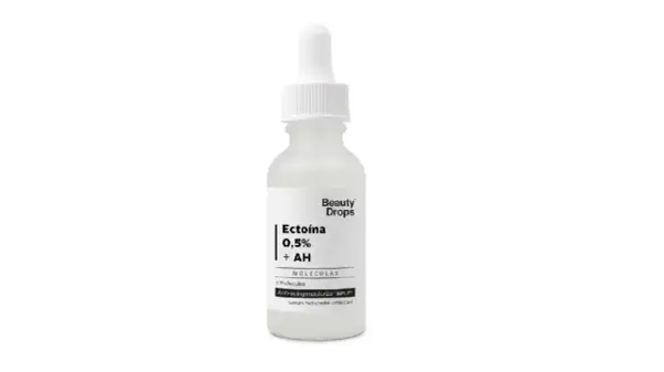 Frasco de sérum Beauty Drops con Ectoína 0,5% + AH, un suero hidratante antiedad.